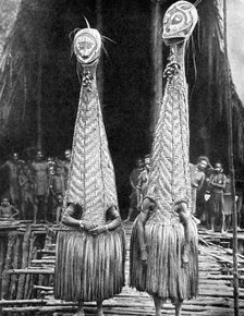 Goblin masks and visors worn as beauty aids, Papua, New Guinea, 1936.Artist: Fox Photos