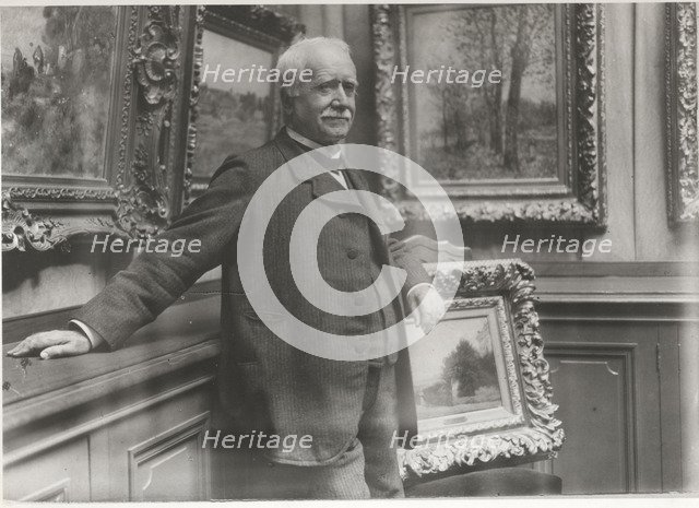 Portrait of Paul Durand-Ruel (1831-1922) in his gallery, c. 1910.