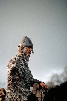 Knight on horseback, from a battle re-enactment.  Artist: Geoffrey Davis