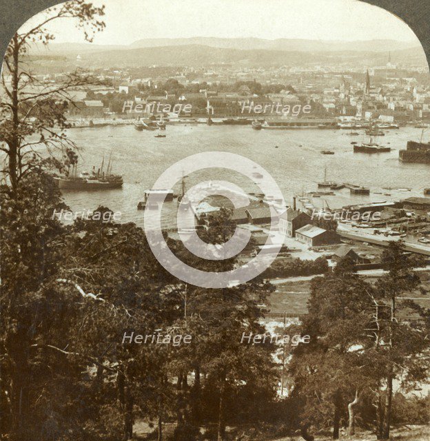 'Christiania and her busy harbor, N.W. from the Ekeberg (Royal Palace at right), Norway', c1905. Creator: Unknown.