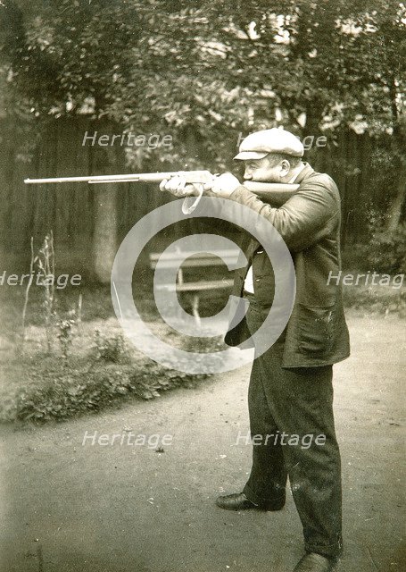 Russian author Alexander Kuprin shooting, Gatchina, Russia, early 20th century.  Artist: Karl Karlovich Bulla