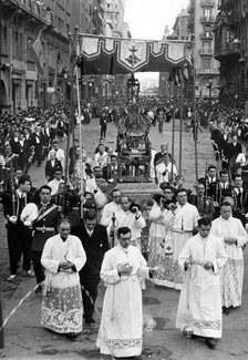 Procession through the Via Layetana in Barcelona on the feast of Corpus Christi, the custody unde…