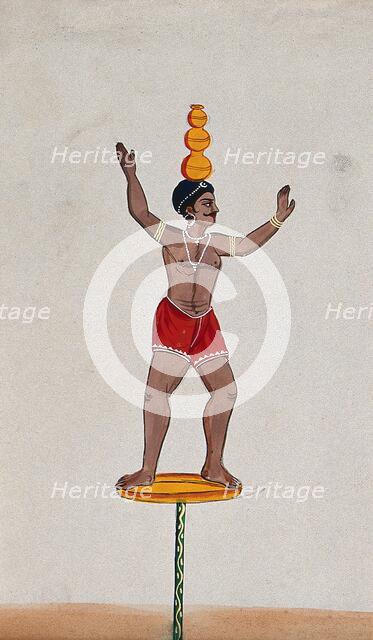 A street performer standing on a disc balancing three pots on his head, (between 1800 and 1899?). Creator: Unknown.