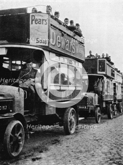 'British troops being moved to a fresh part of the line by motor 'buses', 1915. Artist: Unknown.