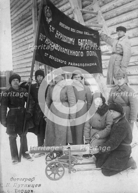 The banner of the Berdsk regional executive committee is held by the soldiers of the 3rd..., 1928. Creator: GP Putintsev.