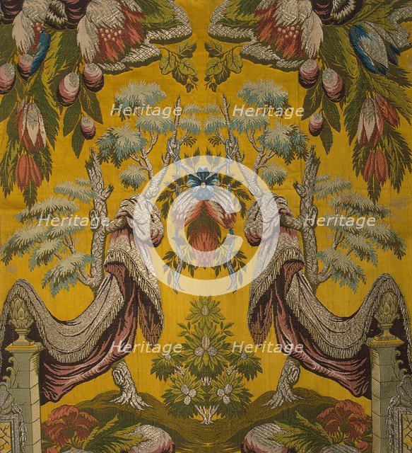 Silk fabric with silver thread, satin ground with a brocaded pattern.