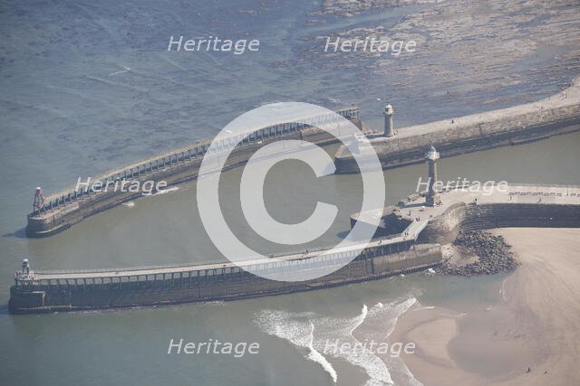 The breakwaters at the entrance to Whitby Harbour, North Yorkshire, 2016. Creator: Dave MacLeod.