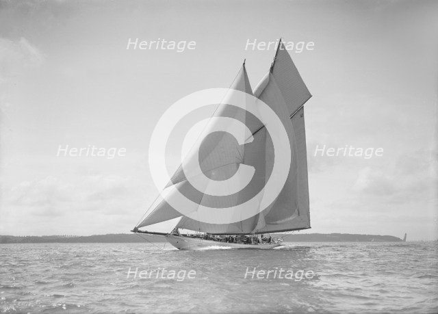 The 250 ton schooner 'Germania' sails close reach, 1911. Creator: Kirk & Sons of Cowes.
