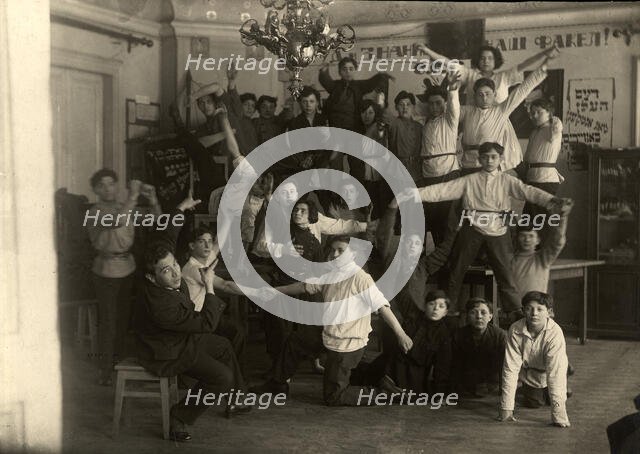 In dorm - Drama club (GOSET artist - Comrade Shteiman), Jewish printing school, Moscow, 1922-1923. Creator: Unknown.