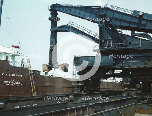 Pennsylvania R.R. ore docks, unloading ore from a lake freighter..., Cleveland, Ohio, 1943. Creator: Jack Delano.