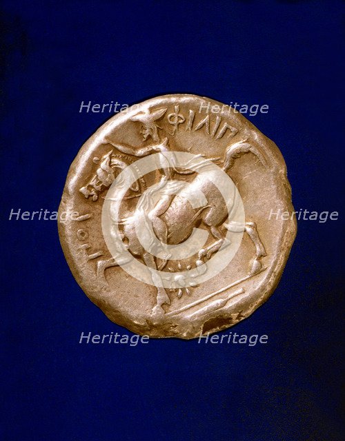 Gold coin with Philip II (382-336 a.C.), king of Macedonia.