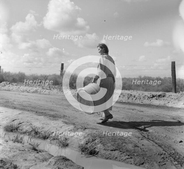 In a migratory labor camp, California, 1936. Creator: Dorothea Lange.