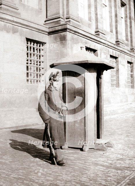 Guard, Brussels, 1898.Artist: James Batkin