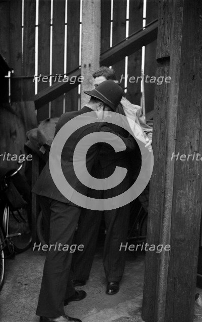 Search by a policeman, c1945-c1965. Artist: SW Rawlings