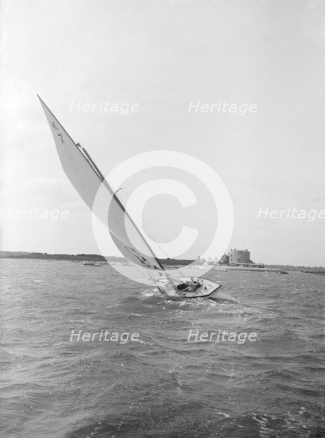 The 7 Metre yacht 'Genevia' (K7) beating to windward, 1912. Creator: Kirk & Sons of Cowes.