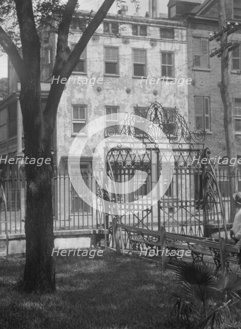 Park and houses, [36 Chalmers Street through Washington Park Gate], Charleston..., c1920-c1926. Creator: Arnold Genthe.