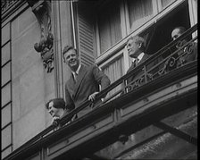 Charles Lindbergh and Anne Morrow Lindbergh On a Balcony Waving To the Press and Crowds, 1927. Creator: British Pathe Ltd.