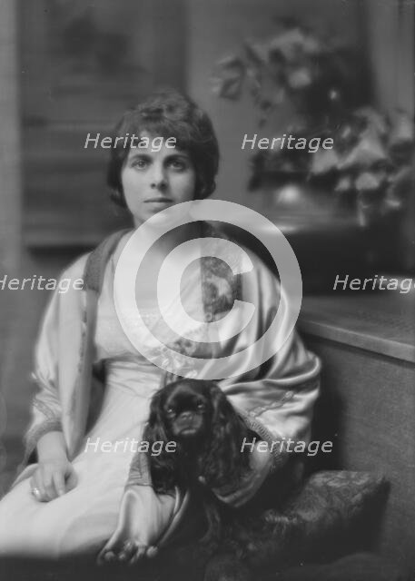 Sutro, Charles, Mrs., and dog, portrait photograph, 1913. Creator: Arnold Genthe.