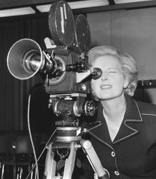 Margaret Thatcher looking through a BBC camera at Heathrow Airport, 6th September 1976. Artist: Unknown