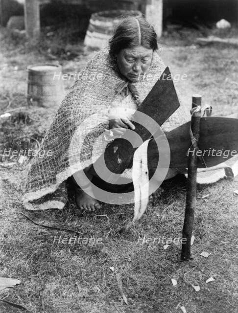 Preparing cedar bark-Nakoaktok, c1914. Creator: Edward Sheriff Curtis.