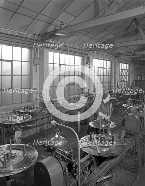 Bandsaw sharpening at Slack Sellars & Co, Sheffield, South Yorkshire, 1963. Artist: Michael Walters