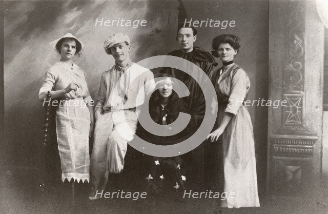 Five costumed figures, 1913. Artist: Unknown