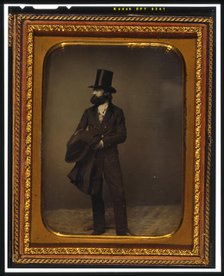 William Sidney Mount, full length portrait, facing left, wearing top hat..., between 1853 and 1860. Creator: Mathew Brady.