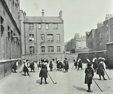 Hockey game, Myrdle Street Girls School, Stepney, London, 1908. Artist: Unknown.