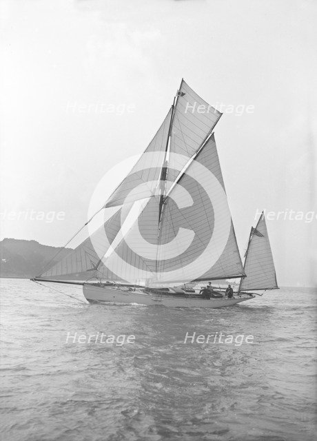 The 46 ft yawl 'Chinkara' under sail, 1913. Creator: Kirk & Sons of Cowes.