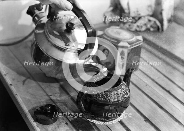 Making tea, c1955. Creator: Arthur Charles Kirby Ware.