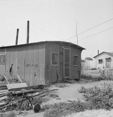 Close-up of present dwelling from which family will move into..., near Yakima, Washington, 1939. Creator: Dorothea Lange.