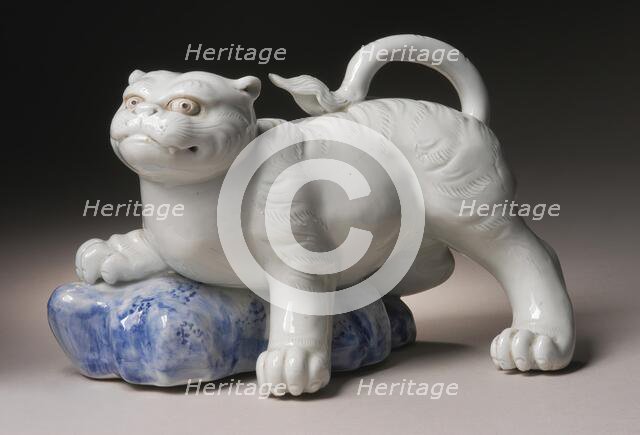 Okimono in the Form of a Tiger Climbing onto a Rock, 19th century. Creator: Unknown.