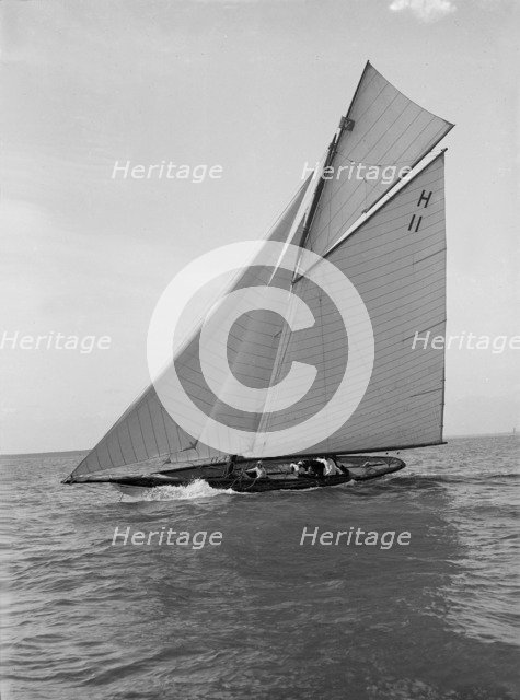 The 8 Metre 'Ventana' (H11) sailing close-hauled, 1914. Creator: Kirk & Sons of Cowes.