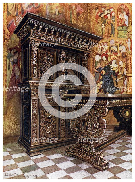 Carved oak armoire, 1910.Artist: Edwin Foley