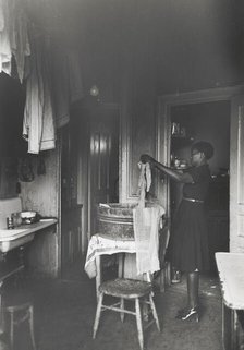 Kitchen of apartment occupied by Negroes, South Side of Chicago, Illinois, April 1941. Creators: Farm Security Administration, Russell Lee.