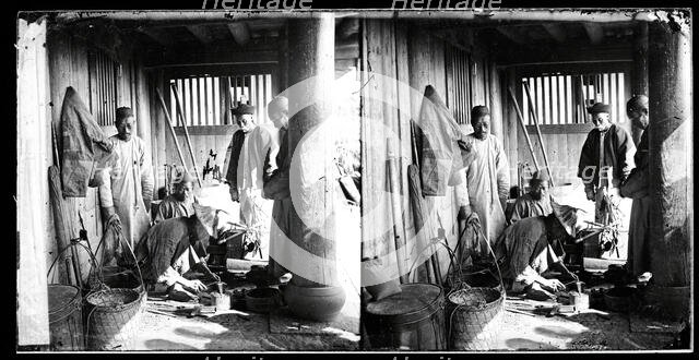 Foochow (Fuzhou), Fukien province, China: a coppersmith at work in his shop, 1871. Creator: John Thomson.