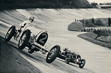 'Earl Howe and Sir Henry Birkin racing at Brooklands', 1937. Artist: Unknown.