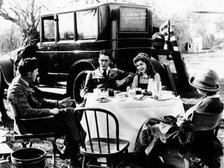 A motoring picnic, America, c1920. Artist: Unknown