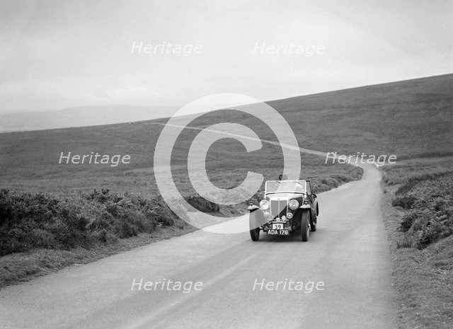 AB Langley's MG Magnette competing at the MCC Torquay Rally, July 1937. Artist: Bill Brunell.