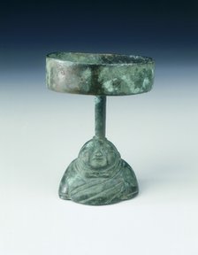 Bronze lamp, the stand in the shape of a warrior's torso, Qin dynasty, China, late 3rd century BC. Artist: Unknown