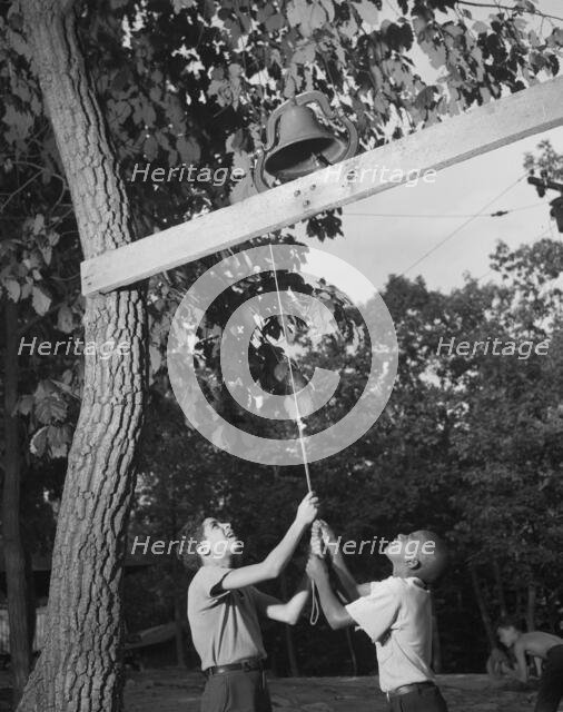 Dinner bell, Camp Nathan Hale, Southfields, New York, 1943 Creator: Gordon Parks.