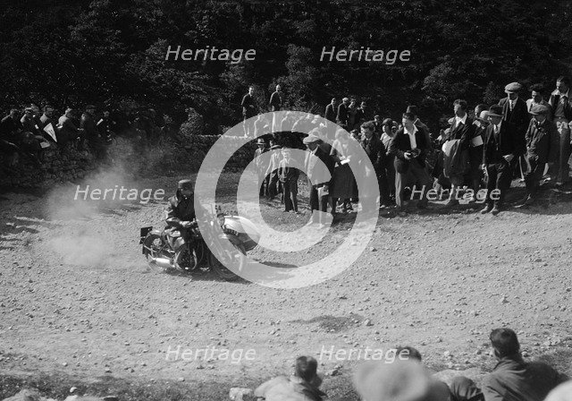 Rudge-Whitworth and sidecar of FV Garratt competing in the MCC Edinburgh Trial, 1930. Artist: Bill Brunell.