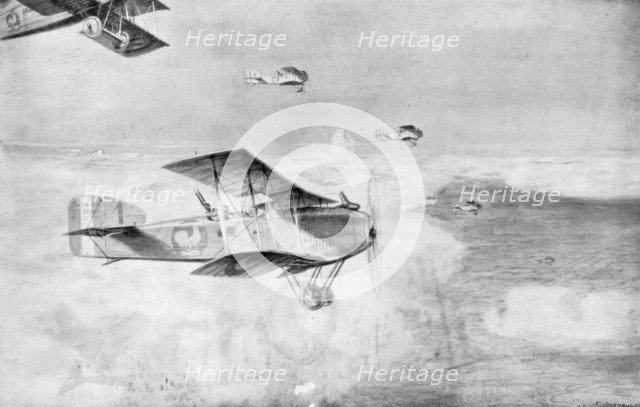 A French squadron of daytime bombers above a sea of clouds, 1918, (1926).Artist: Etienne Cournault