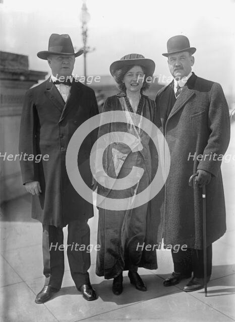 Bird Segle McGuire with Rep. J.S. Davenport, left, and Mrs. McGuire, 1913. Creator: Harris & Ewing.