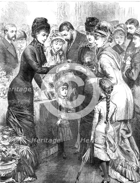 The Princess of Wales selling flowers...Kensington Industrial and Training Girls' School, 1880. Creator: Unknown.