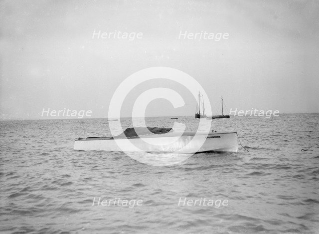 The hydroplane 'Columbine' at anchor. Creator: Kirk & Sons of Cowes.