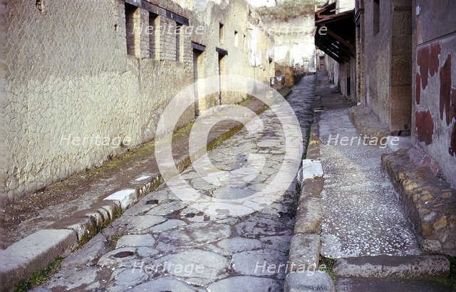 Paved street in the Roman town of Herculaneum, Italy. Artist: Unknown