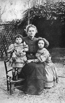 Marie Curie, Polish-born French physicist, with her daughters Eve and Irene, 1908. Artist: Unknown