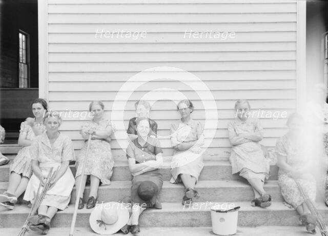 Women assembled at Wheeley's Church near Gordonton, North Carolina, to clean..., 1939. Creator: Dorothea Lange.