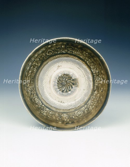 Stoneware bowl with moulded peony scroll and lions, Jin dynasty, China, 13th century. Artist: Unknown